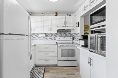 Spectacular remodeled first-floor condo with stunning lake view on Sunrise Lakes Phase III in Florida - for sale on GolfHomes.com, golf home, golf lot