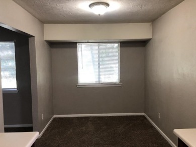 2Bed/1bath Quad overlooking Hilamin Golf Course several long on Hilaman Park Golf Course in Florida - for sale on GolfHomes.com, golf home, golf lot