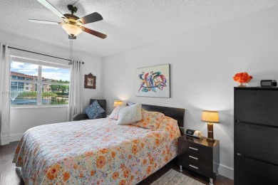 Spectacular remodeled first-floor condo with stunning lake view on Sunrise Lakes Phase III in Florida - for sale on GolfHomes.com, golf home, golf lot