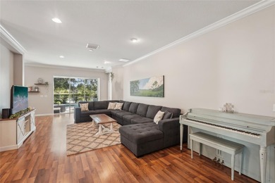 Welcome to a home that feels like vacation the moment you arrive on Esplanade Golf and Country at Lakewood Ranch in Florida - for sale on GolfHomes.com, golf home, golf lot