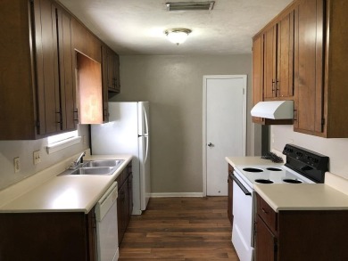 2Bed/1bath Quad overlooking Hilamin Golf Course several long on Hilaman Park Golf Course in Florida - for sale on GolfHomes.com, golf home, golf lot