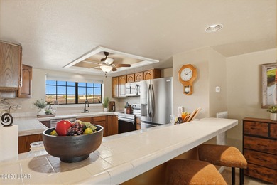 THE CONDO TO OWN - THE ULTIMATE WINTER ESCAPE This prime on London Bridge Golf Course in Arizona - for sale on GolfHomes.com, golf home, golf lot