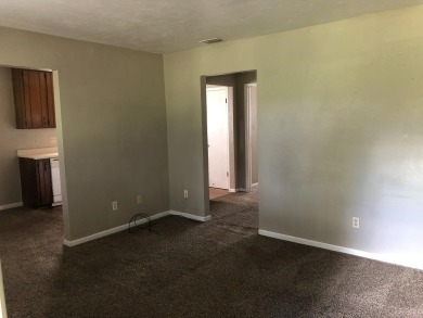 2Bed/1bath Quad overlooking Hilamin Golf Course several long on Hilaman Park Golf Course in Florida - for sale on GolfHomes.com, golf home, golf lot