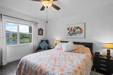 Spectacular remodeled first-floor condo with stunning lake view on Sunrise Lakes Phase III in Florida - for sale on GolfHomes.com, golf home, golf lot