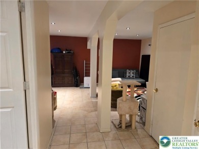 This 4 bedroom, 2 bath split level home sits in an amenity on Pocono Farms Country Club in Pennsylvania - for sale on GolfHomes.com, golf home, golf lot