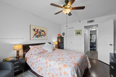 Spectacular remodeled first-floor condo with stunning lake view on Sunrise Lakes Phase III in Florida - for sale on GolfHomes.com, golf home, golf lot