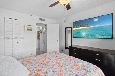 Spectacular remodeled first-floor condo with stunning lake view on Sunrise Lakes Phase III in Florida - for sale on GolfHomes.com, golf home, golf lot