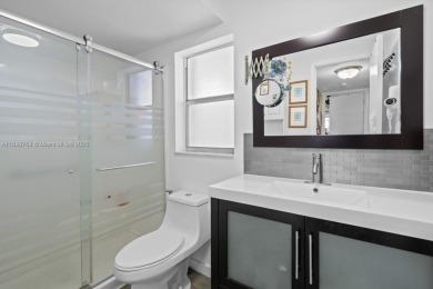 Spectacular remodeled first-floor condo with stunning lake view on Sunrise Lakes Phase III in Florida - for sale on GolfHomes.com, golf home, golf lot