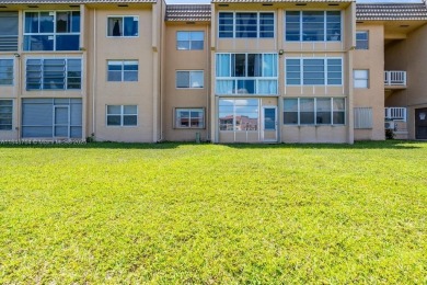 Spectacular remodeled first-floor condo with stunning lake view on Sunrise Lakes Phase III in Florida - for sale on GolfHomes.com, golf home, golf lot