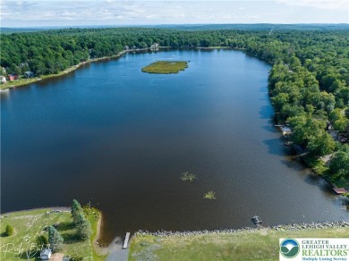This 4 bedroom, 2 bath split level home sits in an amenity on Pocono Farms Country Club in Pennsylvania - for sale on GolfHomes.com, golf home, golf lot