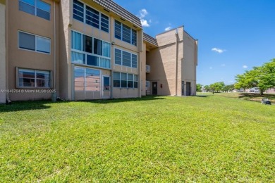 Spectacular remodeled first-floor condo with stunning lake view on Sunrise Lakes Phase III in Florida - for sale on GolfHomes.com, golf home, golf lot