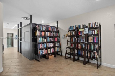 Spectacular remodeled first-floor condo with stunning lake view on Sunrise Lakes Phase III in Florida - for sale on GolfHomes.com, golf home, golf lot