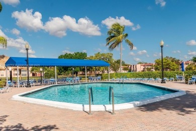 Spectacular remodeled first-floor condo with stunning lake view on Sunrise Lakes Phase III in Florida - for sale on GolfHomes.com, golf home, golf lot