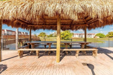 Spectacular remodeled first-floor condo with stunning lake view on Sunrise Lakes Phase III in Florida - for sale on GolfHomes.com, golf home, golf lot