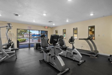 Spectacular remodeled first-floor condo with stunning lake view on Sunrise Lakes Phase III in Florida - for sale on GolfHomes.com, golf home, golf lot