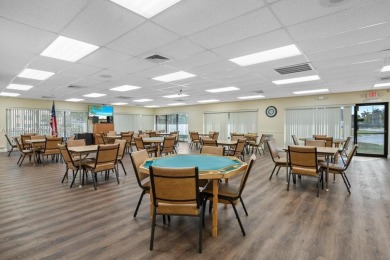 Spectacular remodeled first-floor condo with stunning lake view on Sunrise Lakes Phase III in Florida - for sale on GolfHomes.com, golf home, golf lot