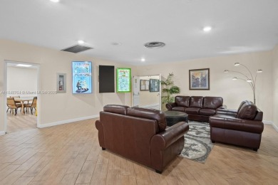 Spectacular remodeled first-floor condo with stunning lake view on Sunrise Lakes Phase III in Florida - for sale on GolfHomes.com, golf home, golf lot