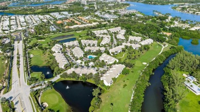 Welcome to 3905 Fairway Drive N, a stunning property located in on Jupiter Dunes Golf Course in Florida - for sale on GolfHomes.com, golf home, golf lot