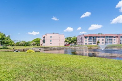 Spectacular remodeled first-floor condo with stunning lake view on Sunrise Lakes Phase III in Florida - for sale on GolfHomes.com, golf home, golf lot