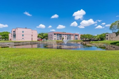Spectacular remodeled first-floor condo with stunning lake view on Sunrise Lakes Phase III in Florida - for sale on GolfHomes.com, golf home, golf lot