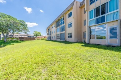 Spectacular remodeled first-floor condo with stunning lake view on Sunrise Lakes Phase III in Florida - for sale on GolfHomes.com, golf home, golf lot