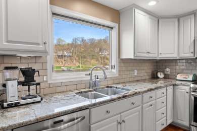 Welcome to a wonderful, classic 2-story home with a walk out on Lake Doster Golf Club in Michigan - for sale on GolfHomes.com, golf home, golf lot