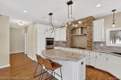 Welcome to this stunning, renovated golf course estate located on Prestwick Village Golf Club in Michigan - for sale on GolfHomes.com, golf home, golf lot