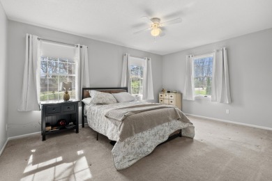 Welcome to a wonderful, classic 2-story home with a walk out on Lake Doster Golf Club in Michigan - for sale on GolfHomes.com, golf home, golf lot