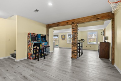 Welcome to a wonderful, classic 2-story home with a walk out on Lake Doster Golf Club in Michigan - for sale on GolfHomes.com, golf home, golf lot