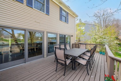 Welcome to a wonderful, classic 2-story home with a walk out on Lake Doster Golf Club in Michigan - for sale on GolfHomes.com, golf home, golf lot