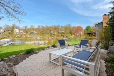 Welcome to a wonderful, classic 2-story home with a walk out on Lake Doster Golf Club in Michigan - for sale on GolfHomes.com, golf home, golf lot