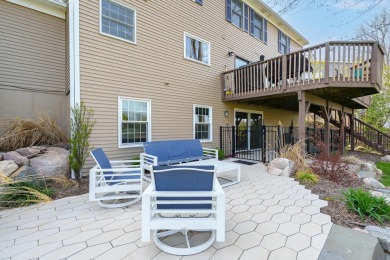 Welcome to a wonderful, classic 2-story home with a walk out on Lake Doster Golf Club in Michigan - for sale on GolfHomes.com, golf home, golf lot