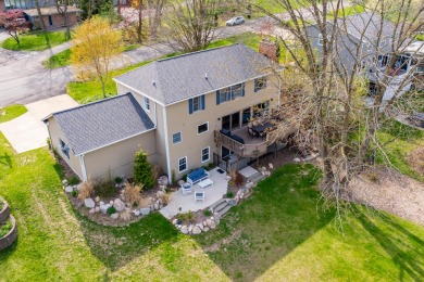 Welcome to a wonderful, classic 2-story home with a walk out on Lake Doster Golf Club in Michigan - for sale on GolfHomes.com, golf home, golf lot