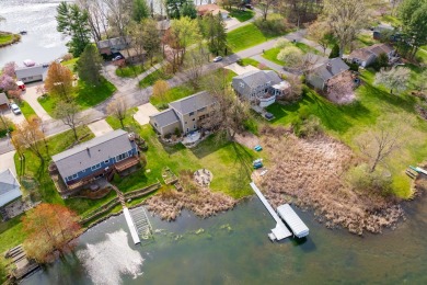 Welcome to a wonderful, classic 2-story home with a walk out on Lake Doster Golf Club in Michigan - for sale on GolfHomes.com, golf home, golf lot