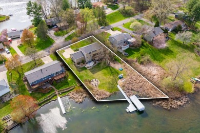 Welcome to a wonderful, classic 2-story home with a walk out on Lake Doster Golf Club in Michigan - for sale on GolfHomes.com, golf home, golf lot