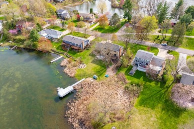 Welcome to a wonderful, classic 2-story home with a walk out on Lake Doster Golf Club in Michigan - for sale on GolfHomes.com, golf home, golf lot