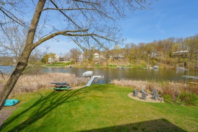 Welcome to a wonderful, classic 2-story home with a walk out on Lake Doster Golf Club in Michigan - for sale on GolfHomes.com, golf home, golf lot