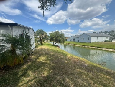 Welcome to one of the largest homes in the Meadows, just over 1 on Golden Lakes Golf Course in Florida - for sale on GolfHomes.com, golf home, golf lot
