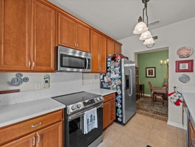 Discover the perfect blend of comfort and convenience in this on ChampionsGate Golf Resort in Florida - for sale on GolfHomes.com, golf home, golf lot