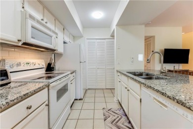 Freshly painted with new LVP and brand-new carpet in June 2023 on Palmetto Dunes Golf Course and Resort in South Carolina - for sale on GolfHomes.com, golf home, golf lot