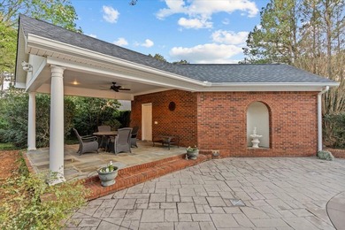 Set on a secluded street directly across from the Robert Trent on Highland Oaks Golf Course in Alabama - for sale on GolfHomes.com, golf home, golf lot
