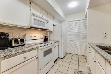 Freshly painted with new LVP and brand-new carpet in June 2023 on Palmetto Dunes Golf Course and Resort in South Carolina - for sale on GolfHomes.com, golf home, golf lot