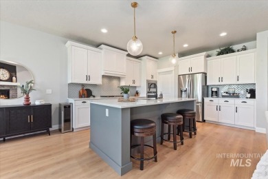 Stunning home on the 17th fairway of Red Hawk golf course! A on Hunters Point Golf Club in Idaho - for sale on GolfHomes.com, golf home, golf lot