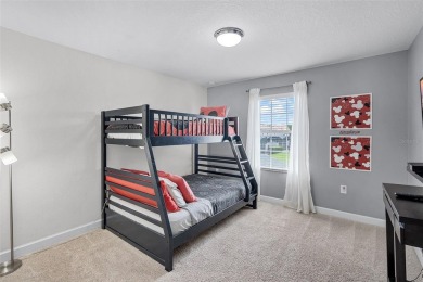 Step into the ultimate vacation lifestyle at 1578 Slice Way, a on The Oasis Club at Champions Gate in Florida - for sale on GolfHomes.com, golf home, golf lot