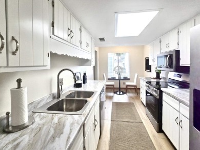 Looking for easy living in a central location with convenience on Hilaman Park Golf Course in Florida - for sale on GolfHomes.com, golf home, golf lot