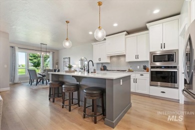 Stunning home on the 17th fairway of Red Hawk golf course! A on Hunters Point Golf Club in Idaho - for sale on GolfHomes.com, golf home, golf lot