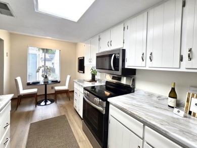 Looking for easy living in a central location with convenience on Hilaman Park Golf Course in Florida - for sale on GolfHomes.com, golf home, golf lot