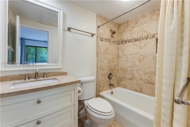 Freshly painted with new LVP and brand-new carpet in June 2023 on Palmetto Dunes Golf Course and Resort in South Carolina - for sale on GolfHomes.com, golf home, golf lot