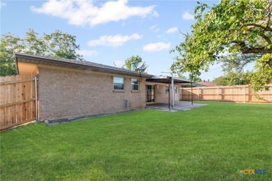 Nestled in an inviting and established neighborhood, this on Sammons Golf Links in Texas - for sale on GolfHomes.com, golf home, golf lot