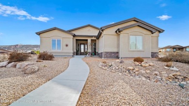 Welcome home to the heart of Redlands Mesa, where breathtaking on The Golf Club At Redlands Mesa in Colorado - for sale on GolfHomes.com, golf home, golf lot